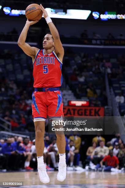 Frank Jackson of the Detroit Pistons shoots against the New Orleans Pelicans during a game at the Smoothie King Center on December 10, 2021 in New...