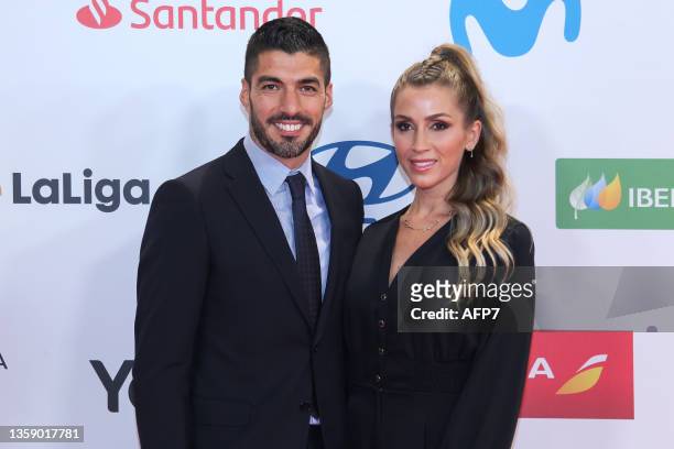 Luis Suarez of Atletico de Madrid and his wife Sofia Balbi attend during the arrival red carpet at the "AS Sports Awards 2021" held at The Westin...