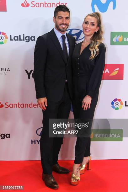 Luis Suarez of Atletico de Madrid and his wife Sofia Balbi attend during the arrival red carpet at the "AS Sports Awards 2021" held at The Westin...