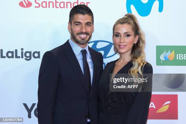 Luis Suarez of Atletico de Madrid and his wife Sofia Balbi attend during the arrival red carpet at the "AS Sports Awards 2021" held at The Westin...