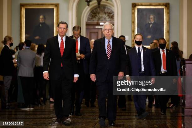 Sen. John Barrasso , Senate Minority Leader Mitch McConnell and fellow Republicans arrive for a news conference in the Ohio Clock Corridor following...