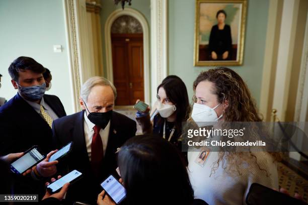 Senate Environment and Public Works Committee Chair Tom Carper talks to reporters after leaving Senate Majority Leader Charles Schumer's office at...