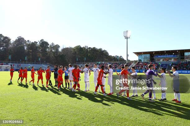 The Clemson Tigers take on the Washington Huskies during the Division I Men's Soccer Championship held at Sahlen's Stadium at WakeMed Soccer Park on...