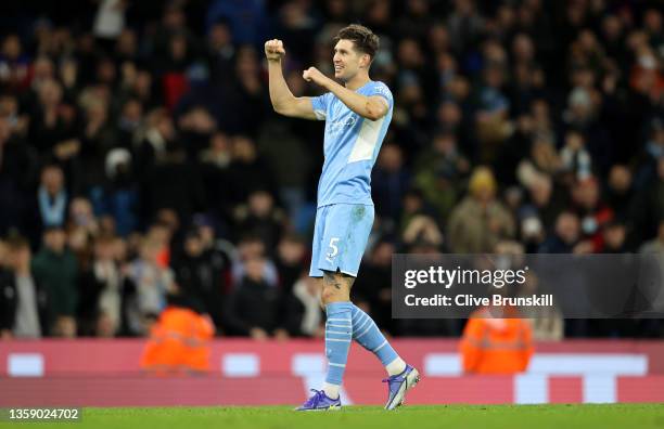 John Stones of Manchester City celebrates after scoring their side's sixth goal during the Premier League match between Manchester City and Leeds...