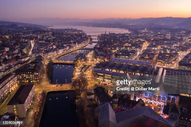 aerial view of zurich downtown district at sunset in switzerland - zurich skyline stock-fotos und bilder