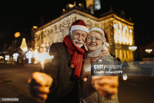 christmas - old man woman christmas stock pictures, royalty-free photos & images