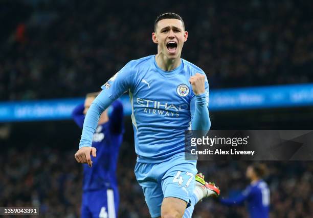 Phil Foden of Manchester City celebrates after scoring their side's first goal during the Premier League match between Manchester City and Leeds...