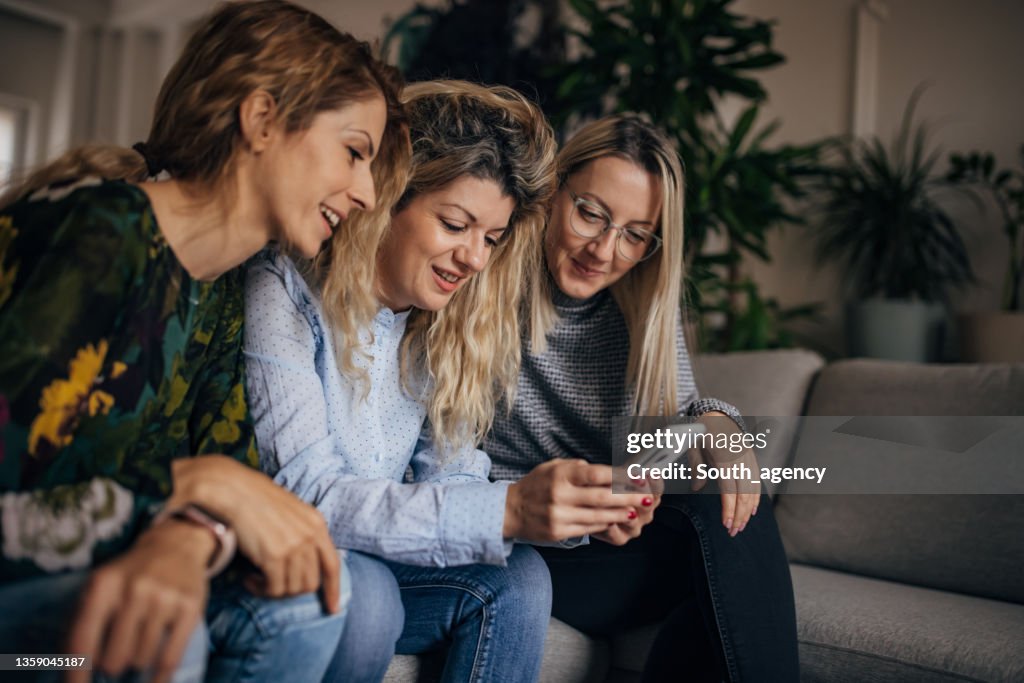 Modern Women Using Smart Phone High-Res Stock Photo - Getty Images
