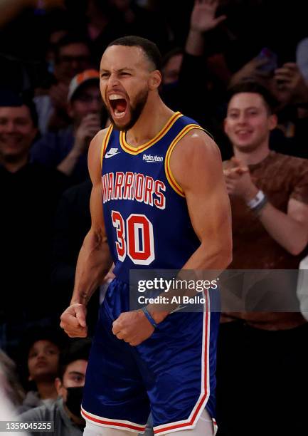 Stephen Curry of the Golden State Warriors celebrates after making a three point basket to break Ray Allen’s record for the most all-time against the...