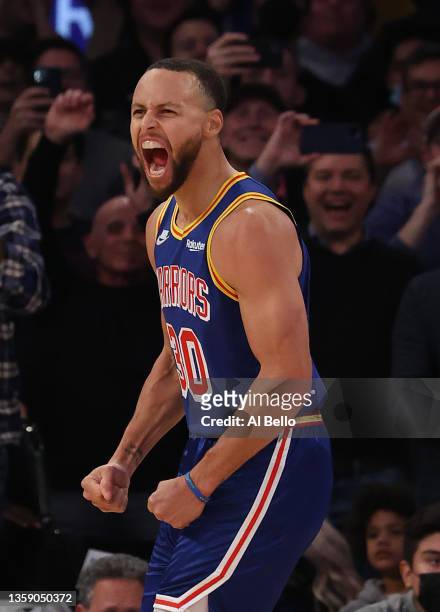 Stephen Curry of the Golden State Warriors celebrates after making a three point basket to break Ray Allen’s record for the most all-time against the...