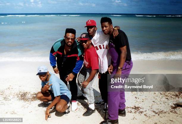 Singers Nate , Wanya , Shawn and Michael of Boyz II Men poses for photos with their road manager Khalil Rountree during 'Motown Soul By The Sea II'...