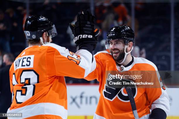 Keith Yandle of the Philadelphia Flyers celebrates with teammate Kevin Hayes after they defeated the New Jersey Devils at Wells Fargo Center on...