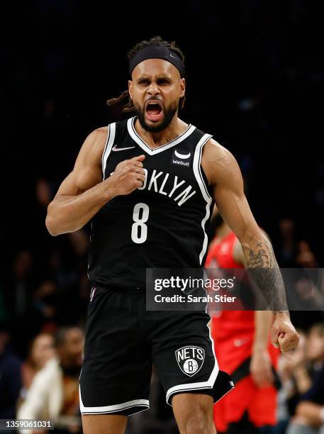 Patty Mills of the Brooklyn Nets reacts after making a three-point basket during the second half against the Toronto Raptors at Barclays Center on...