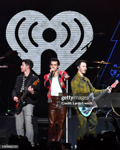 Nick Jonas, Joe Jonas, and Kevin Jonas of Jonas Brothers perform onstage during iHeartRadio Hot 99.5's Jingle Ball 2021 Presented by Capital One at...