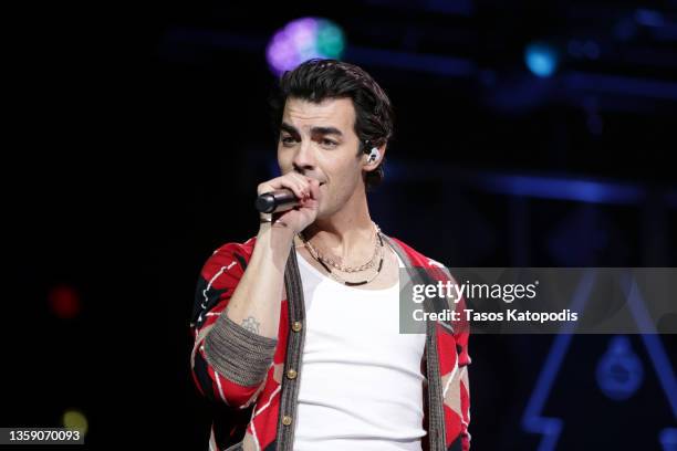 Joe Jonas of Jonas Brothers performs onstage during iHeartRadio Hot 99.5's Jingle Ball 2021 Presented by Capital One at Capital One Arena on December...