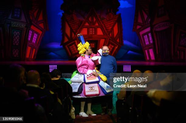 Clive Rowe's "Dame Trot" finds a new man from the audience during an evening performance of "Jack and The Beanstalk" pantomime at the Hackney Empire...