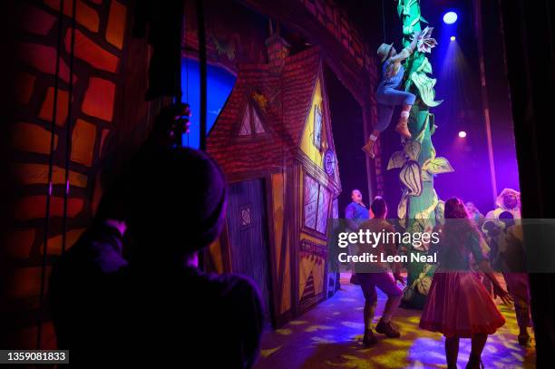 Jack Trot", played by Rochelle Sherona, is hoisted by wires as she climbs the beanstalk during an evening performance of "Jack and The Beanstalk"...