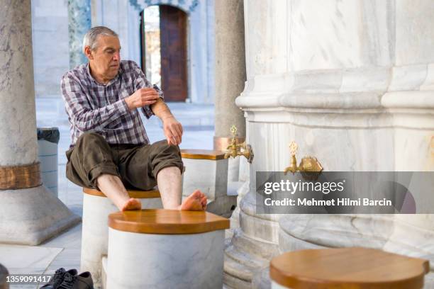 muslim praying time to ramadan - old man feet stock pictures, royalty-free photos & images