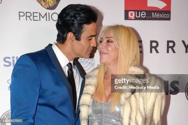 Juan Vidal and Cynthia Klitbo interact on the red carpet during the Q Awards by Q magazine at Teatro Centenario Coyoacan on December 14, 2021 in...