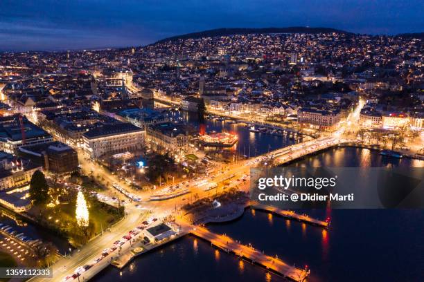 aerial night view of the guisan quay in zurich city center in switzerland - zurich winter stock pictures, royalty-free photos & images