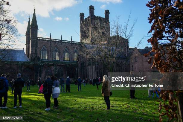 People queue outside Chester Cathedral where British soldiers are administering Covid-19 vaccines on December 15, 2021 in Manchester, England. The...