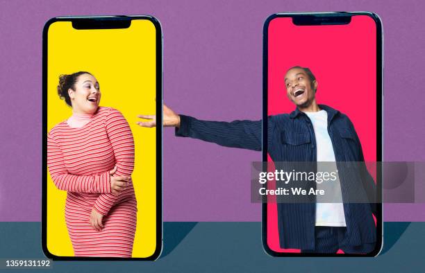 young woman and man inside smartphone flirting - dating stock pictures, royalty-free photos & images