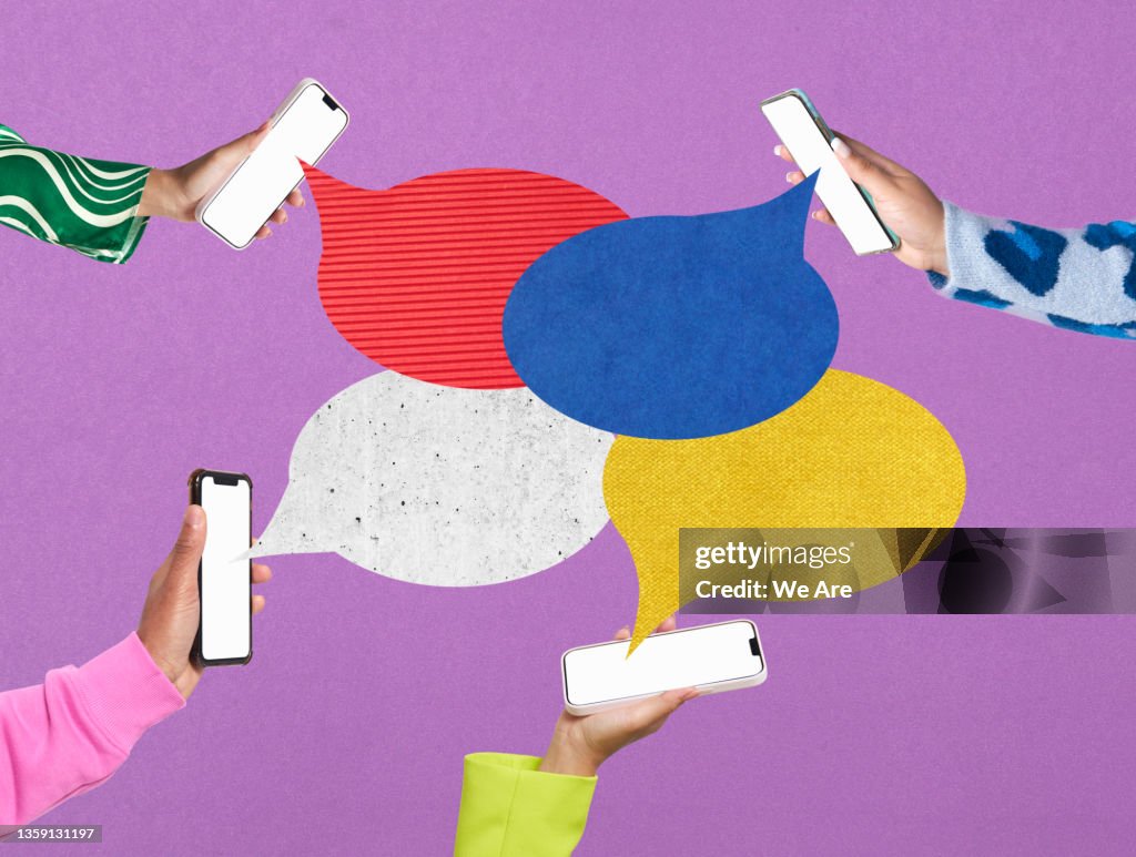 Women holding smartphones having an online conversation