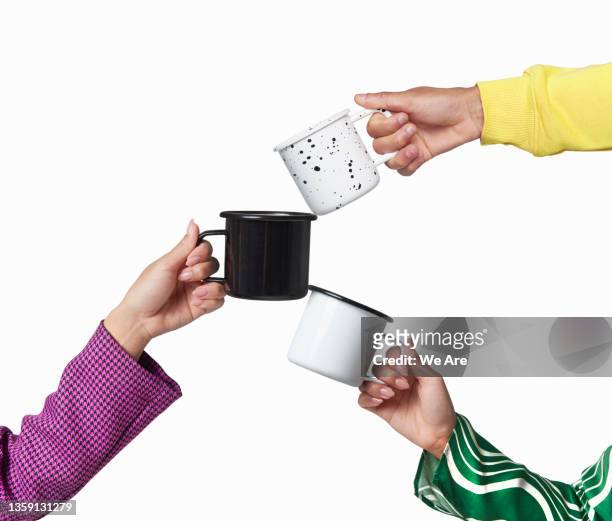three people toasting with mugs - taza cafe fotografías e imágenes de stock
