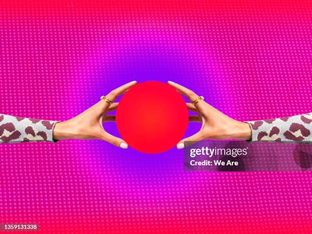 women's hands holding a red circle - image manipulation bildbanksfoton och bilder