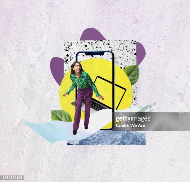 young fashionable woman stepping out of smartphone into open space - digital composite stockfoto's en -beelden