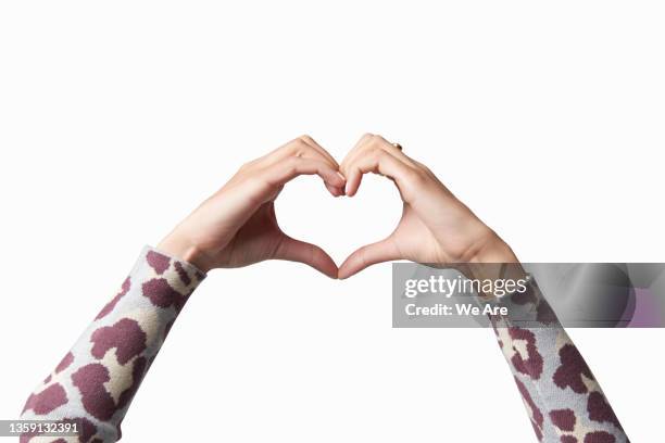 hands creating love heart shape - represented stock pictures, royalty-free photos & images