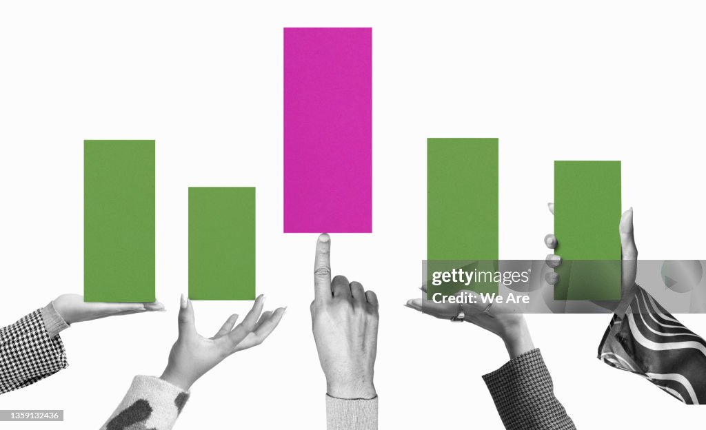 Hands holding up columns of bar graph