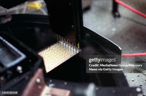 Photograph by Nhat V. Meyer in Palo Alto on Friday, June 9, 2000. A close-up photograph of a "M13 DNA Preparation Robot" at the Stanford Genome...