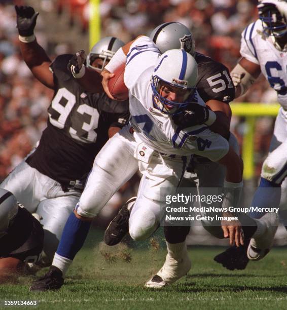Aaron Wallace sacks Colts' Jim Harbaugh for a 10-yard loss in the first quarter. It was one of four sacks for the Raiders. [951023 SP 8D 1] 10/23...