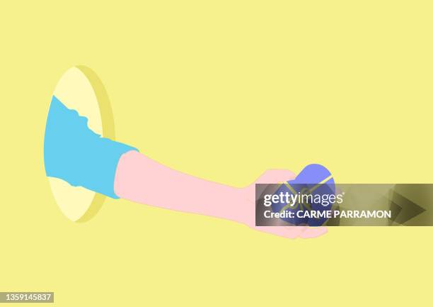 a hand giving a christmas present with love box - chocolates box stock illustrations