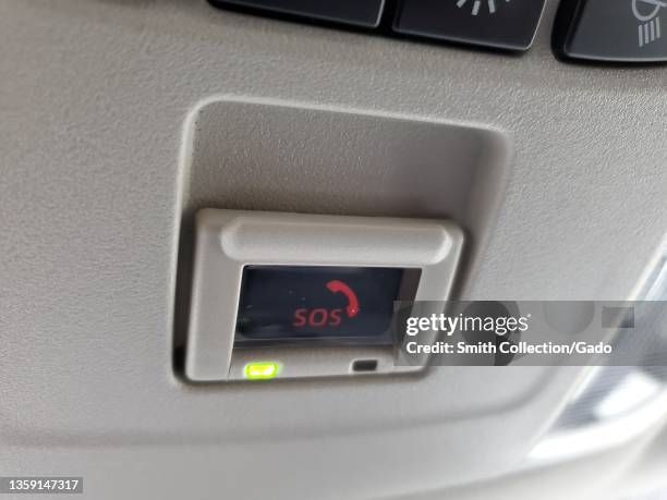 Button to call emergency services in a Toyota Corolla car, Lafayette, California, December 6, 2021.