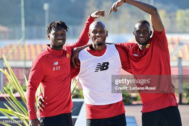 Ebrima Darboe, Amadou Diawara and Maissa Ndiaye gesture during as AS Roma training session at Centro Sportivo Fulvio Bernardini on December 15, 2021...