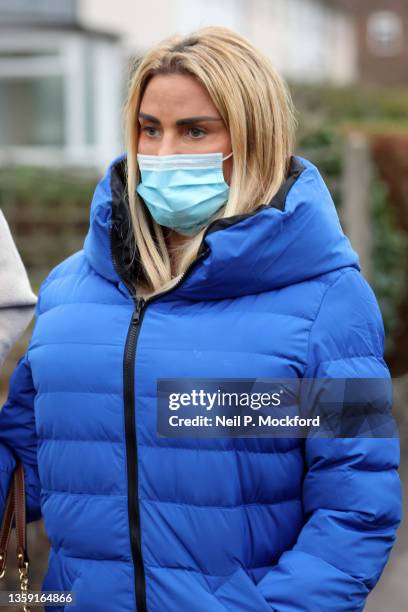 Katie Price and Carl Woods departing Crawley Magistrates Court after Katie Price's sentencing on December 15, 2021 in Crawley, England.