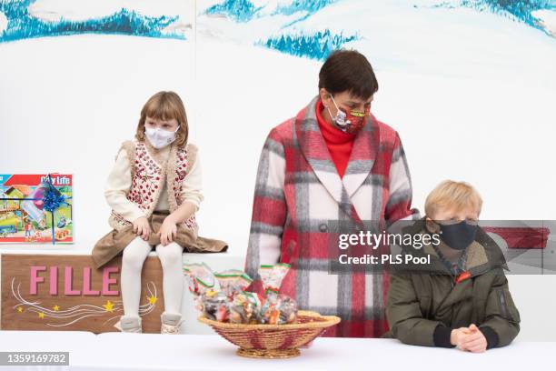 Princess Gabriella of Monaco, Princess Stephanie of Monaco and Prince Jacques of Monaco attend Christmas tree at Monaco Palace on December 15, 2021...