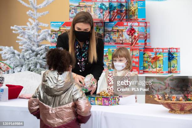 Camille Gottlieb and Princess Gabriella of Monaco attend Christmas tree at Monaco Palace on December 15, 2021 in Monte Carlo, France.