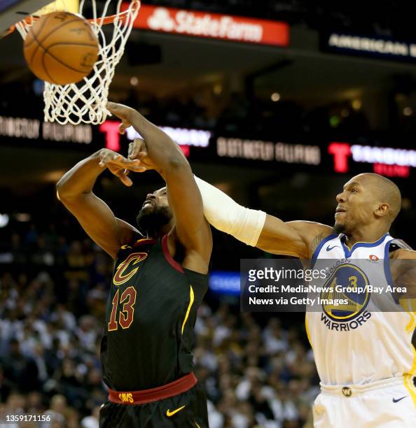 Golden State Warriors' David West fouls Cleveland Cavaliers' Tristan Thompson in the third quarter of their NBA game at Oracle Arena in Oakland,...