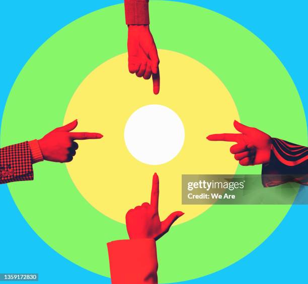 four hands pointing at circle - target imagens e fotografias de stock