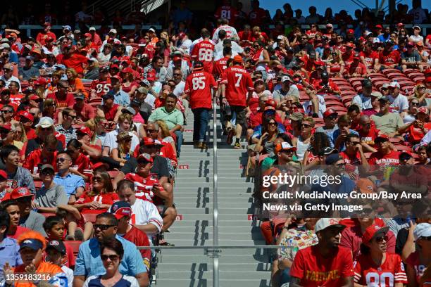 Fans walk up the stairs a they leave their seats in the third quarter of of their preseason NFL game at Levi's Stadium in Santa Clara, Calif., on...