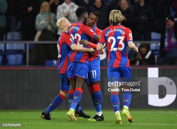 Wilfried Zaha of Crystal Palace celebrates after scoring their sides first goal with team mates Will Hughes, Odsonne Edouard and Conor Gallagher...