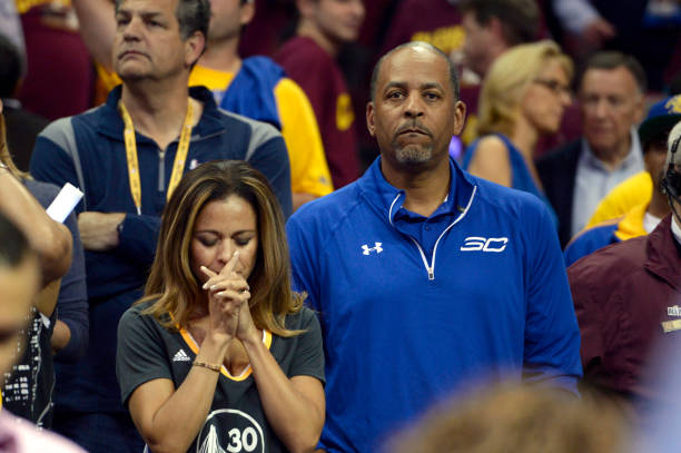Golden State Warriors' Stephen Curry's parents Sonya Curry, left, and Dell, stand up for the start of Game 6 of the NBA Finals against the Cleveland...