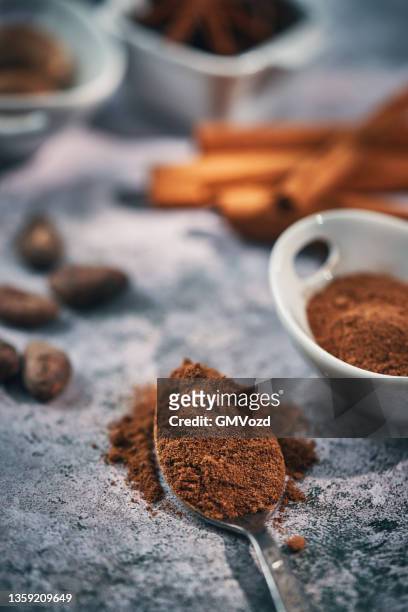 spice mix nutmeg, cardamon, star anise and cinnamon - nutmeg stock pictures, royalty-free photos & images