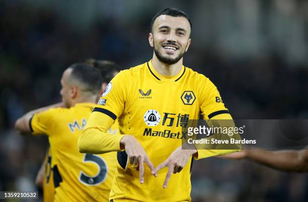 Romain Saiss of Wolverhampton Wanderers celebrates after scoring their sides first goal during the Premier League match between Brighton & Hove...