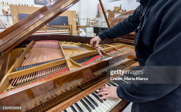 repairing classical pianos - tuning stock pictures, royalty-free photos & images