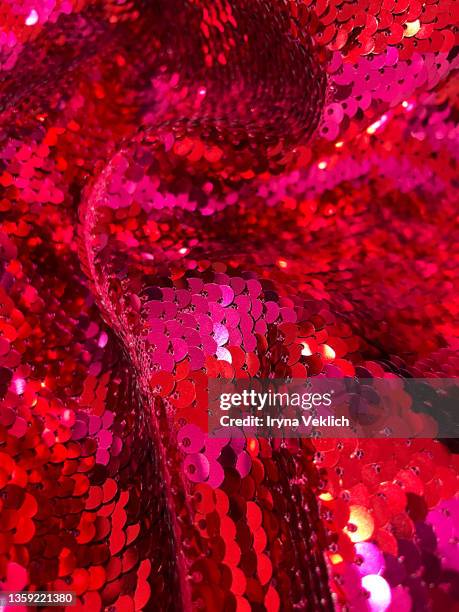 xmas present, gift, congratulation, beauty product shiny glittering background  in trendy red pink purple  color.  glitter winter holidays and valentine's day card trendy concept. - cocktail party dress stock pictures, royalty-free photos & images