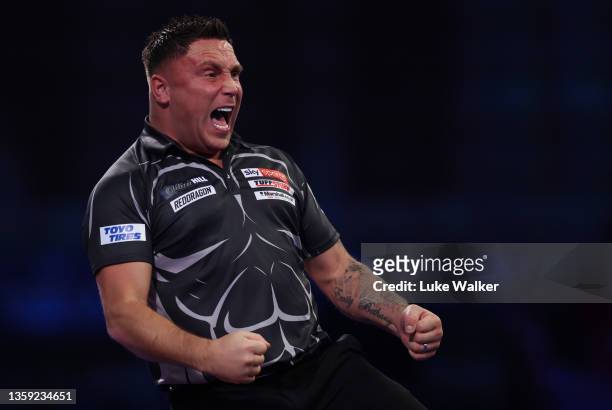 Gerwyn Price of Wales reacts during his Second Round match against Ritchie Edhouse of England during the William Hill World Darts Championship at...
